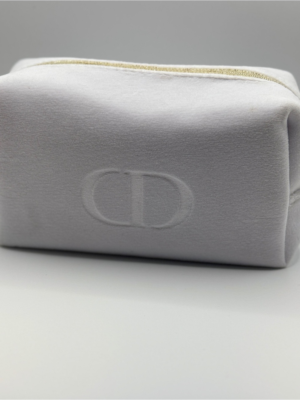 Dior White Embossed makeup bag